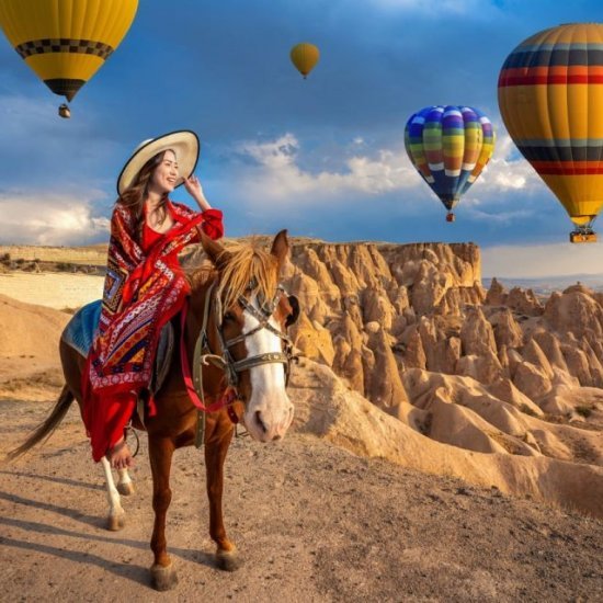 Cappadocia: Horse Riding with Balloons Above at Sunrise