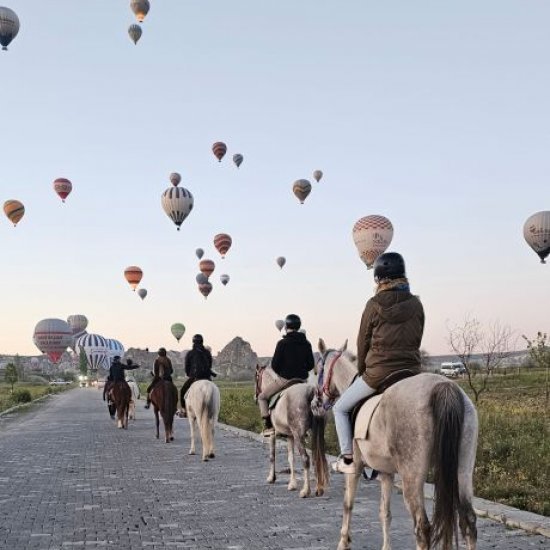 Cappadocia: Horse Riding with Balloons Above at Sunrise